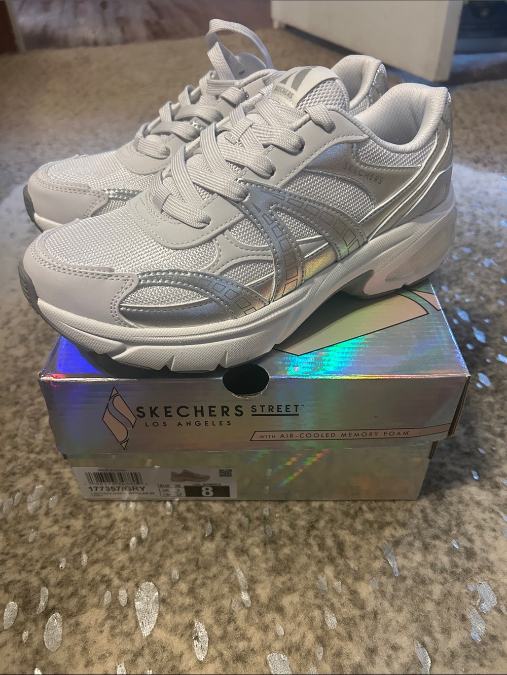 Skechers Women's White Sneakers with Silver Metallic Accents